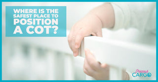 Where is the safest place to position a cot?